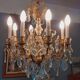Chandelier cage with grapevines 8 lights Louis XV style in bronze and crystal around 1900
