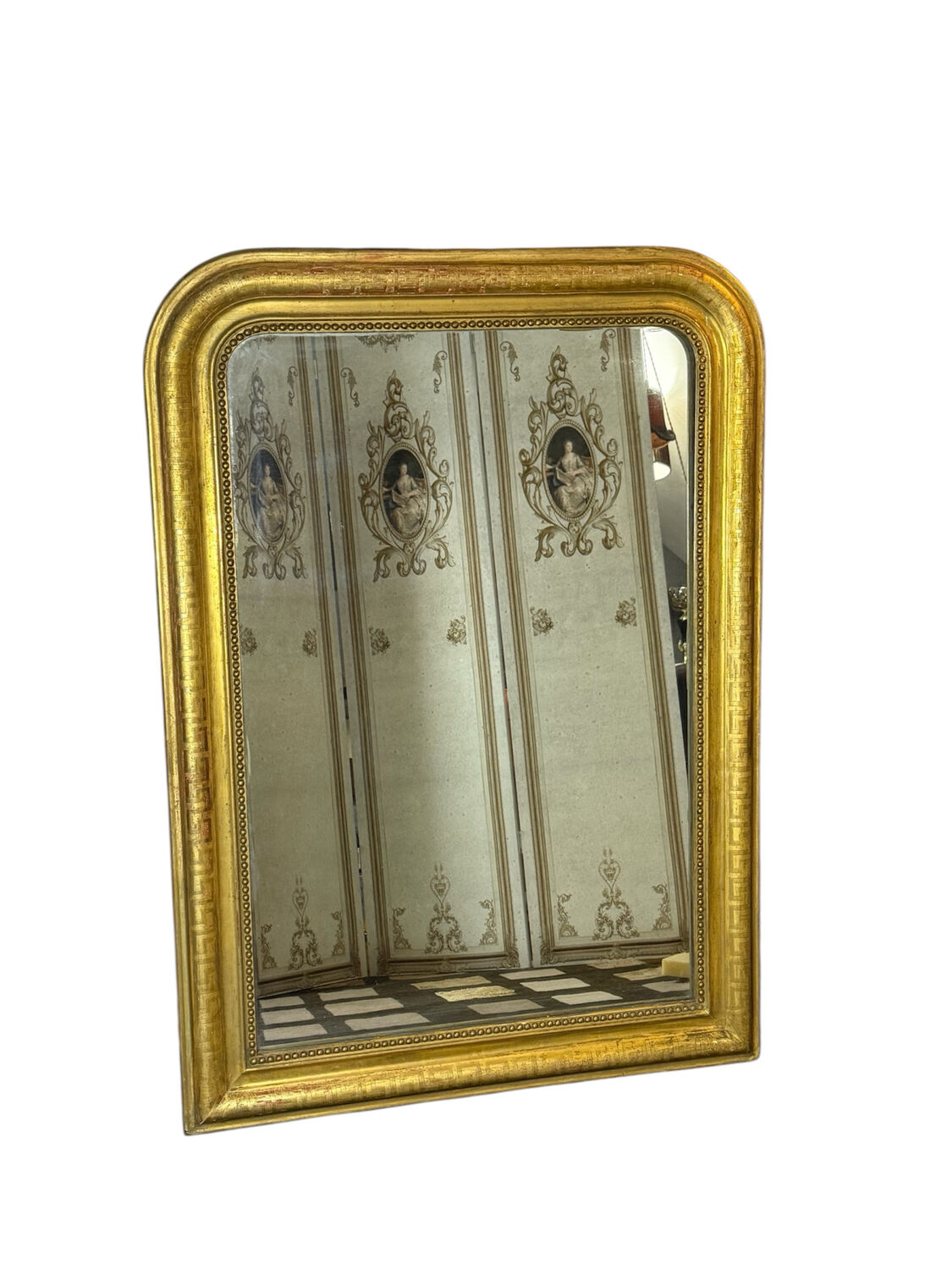Large Louis Philippe mirror in wood and gilded stucco, 19th century.