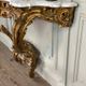 Louis XV style console in carved and gilded wood, circa 1880.