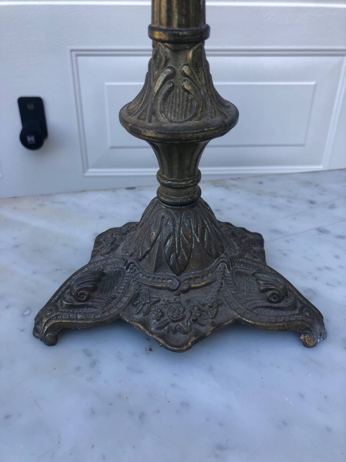 4 identical old brass candlesticks