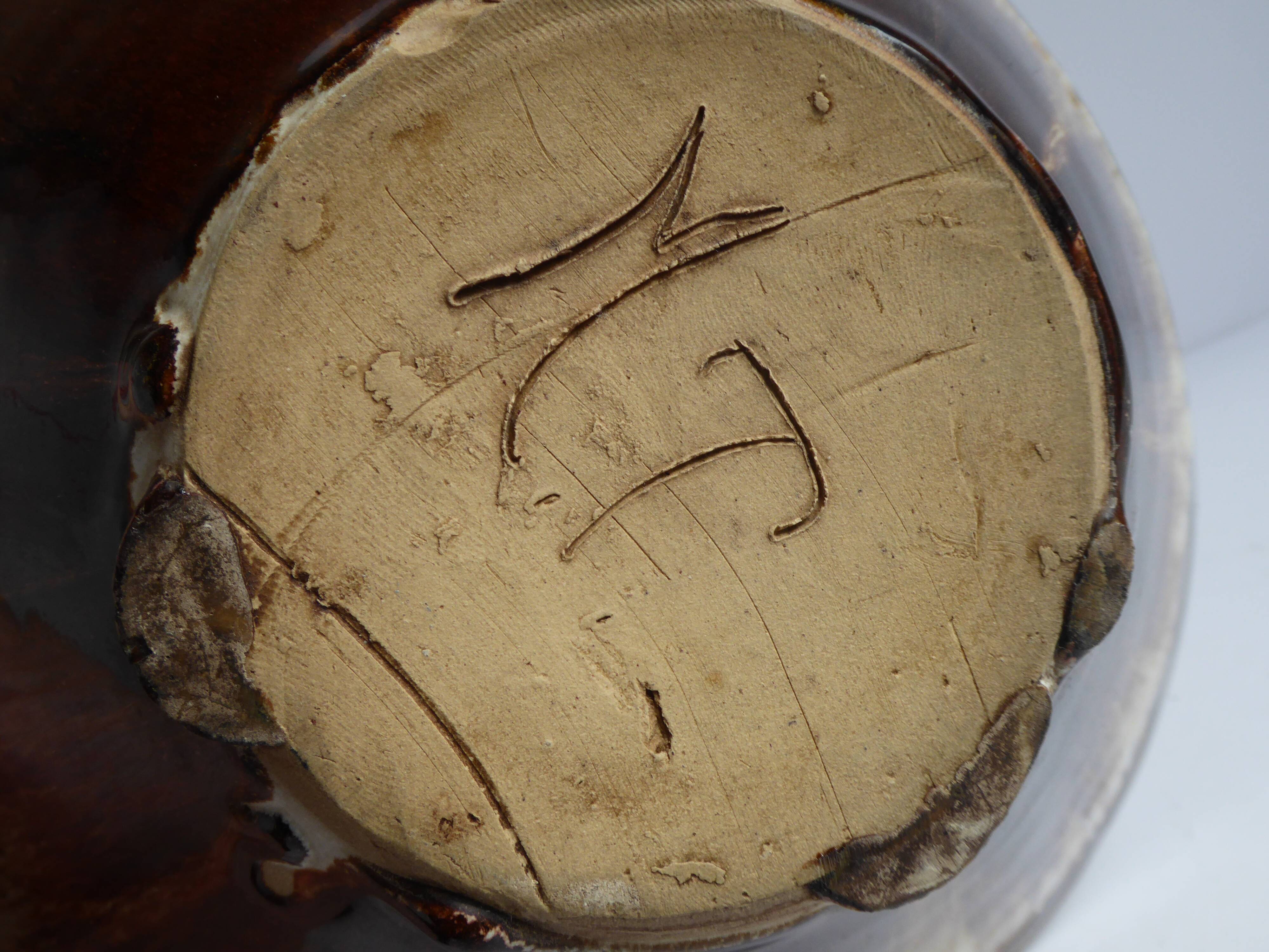 Enamelled terracotta cup