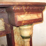 19th century wooden fireplace, faux marble paint. Can act as a console.