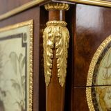 Empire style chest of drawers in lacquer, bronze and marble. Nineteenth century.