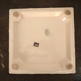 Digoin plate under pink earthenware