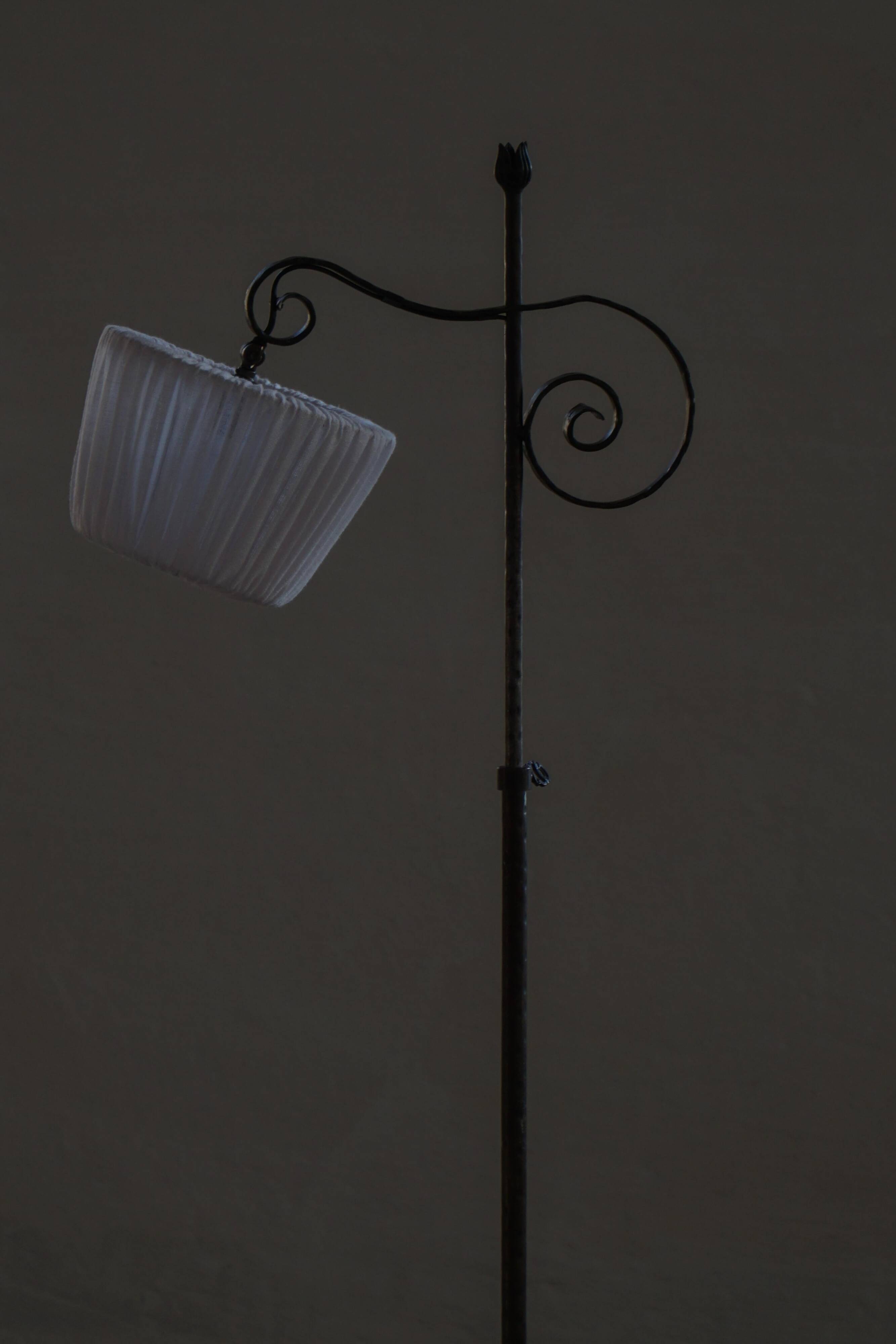 20th-century wrought iron floor lamp with swirling detail, Danish Art Deco.