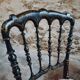Pair of antique Napoleon III chairs in blackened wood and fabric.