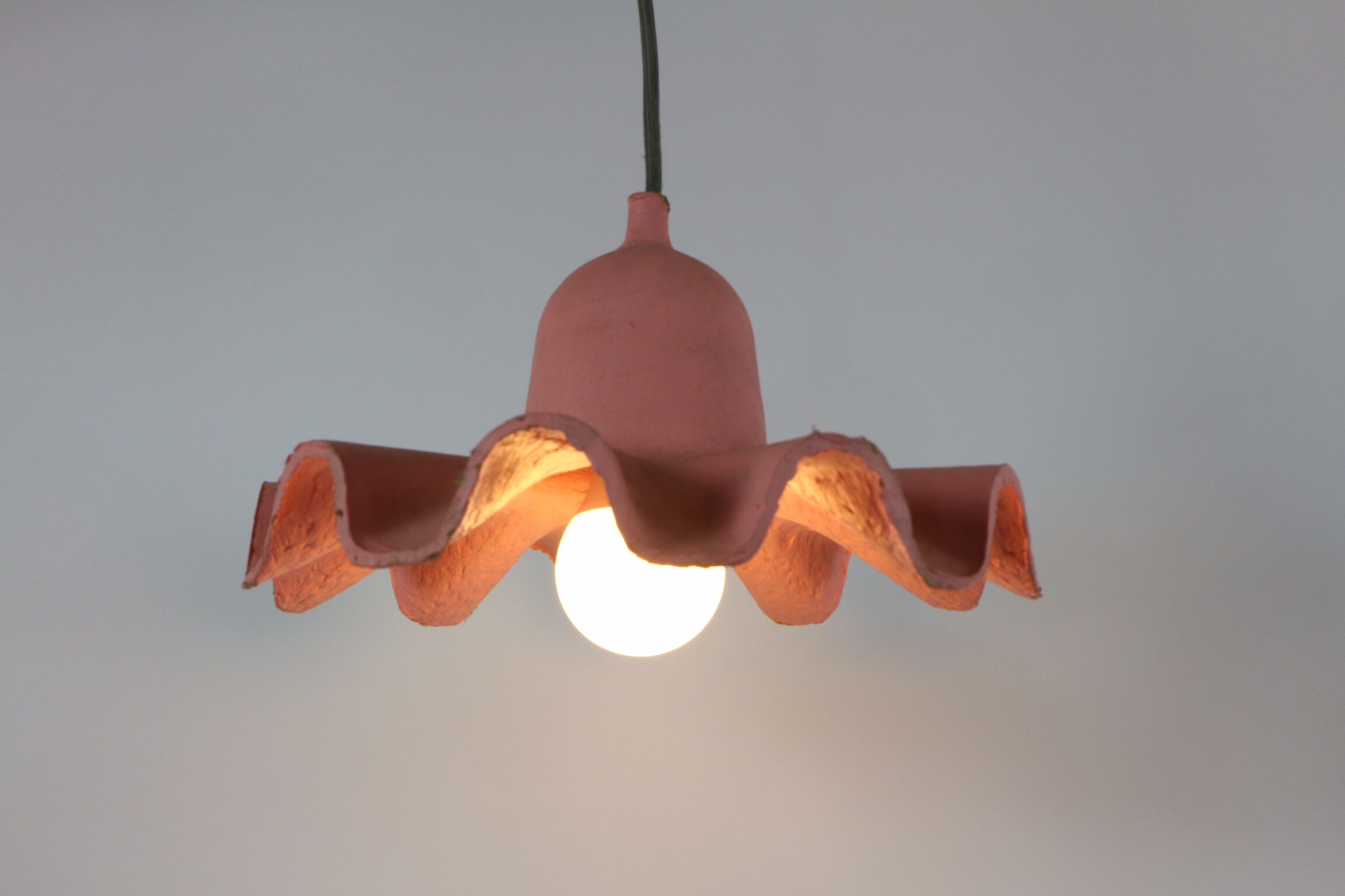 Two lamps/ pendant lamps in recycled cardboard, pink and green, seletti