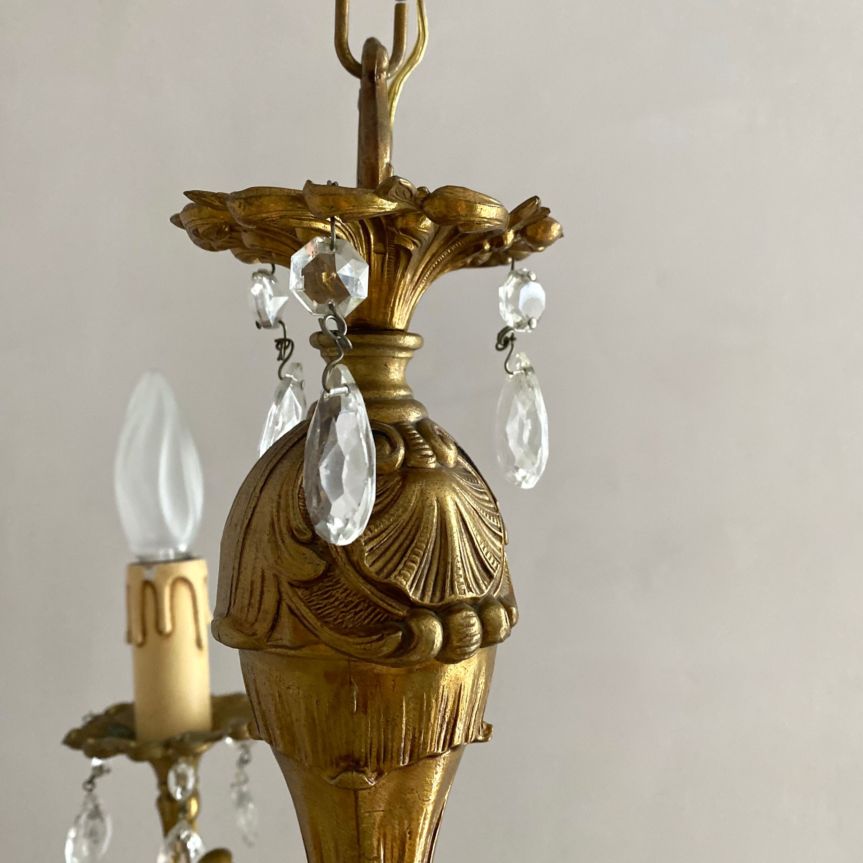 Chandelier with tassels and brass
