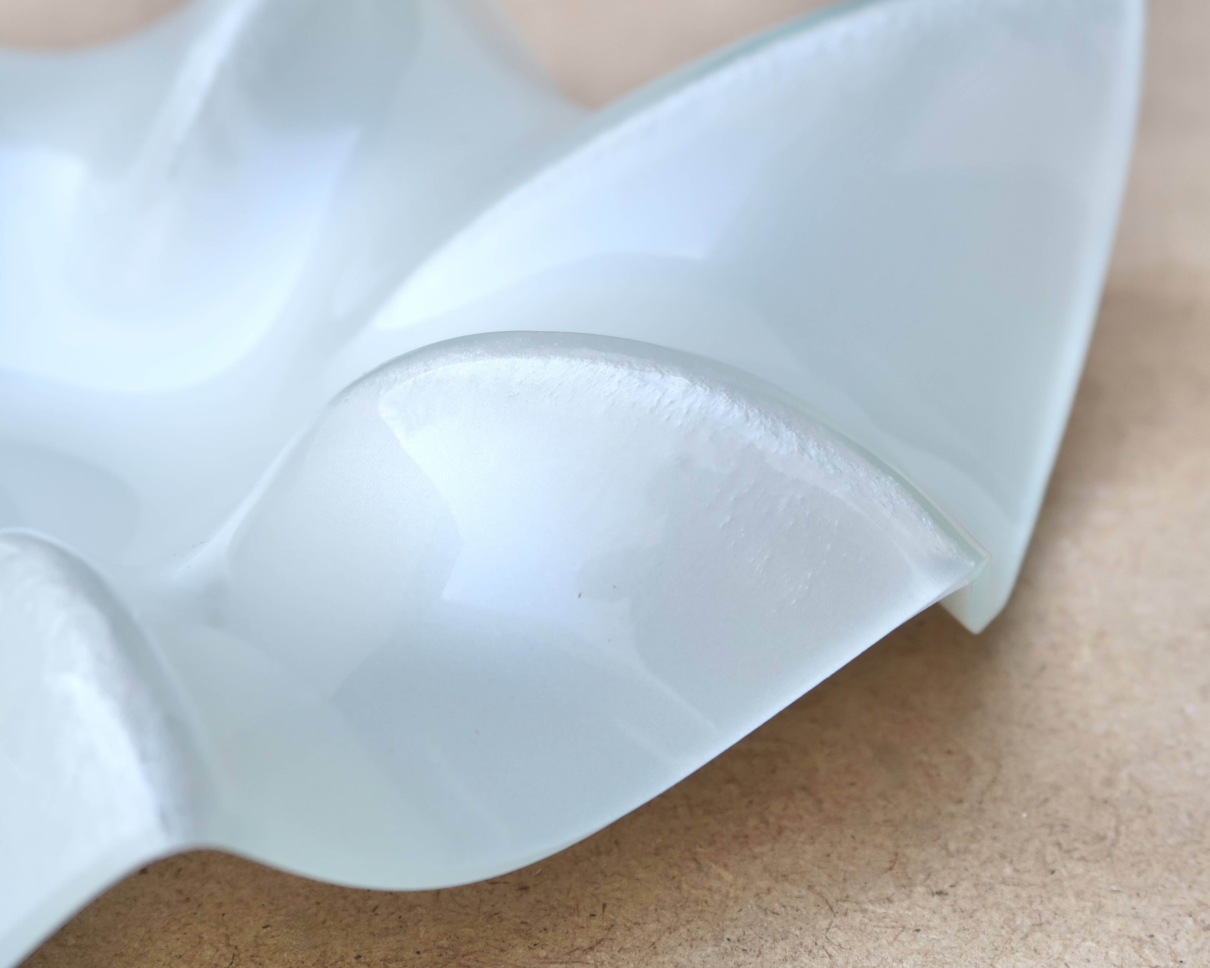 Empty pocket cup in pearly glass signed Pierre Cardin, 1970s