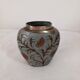 Enameled brass vase