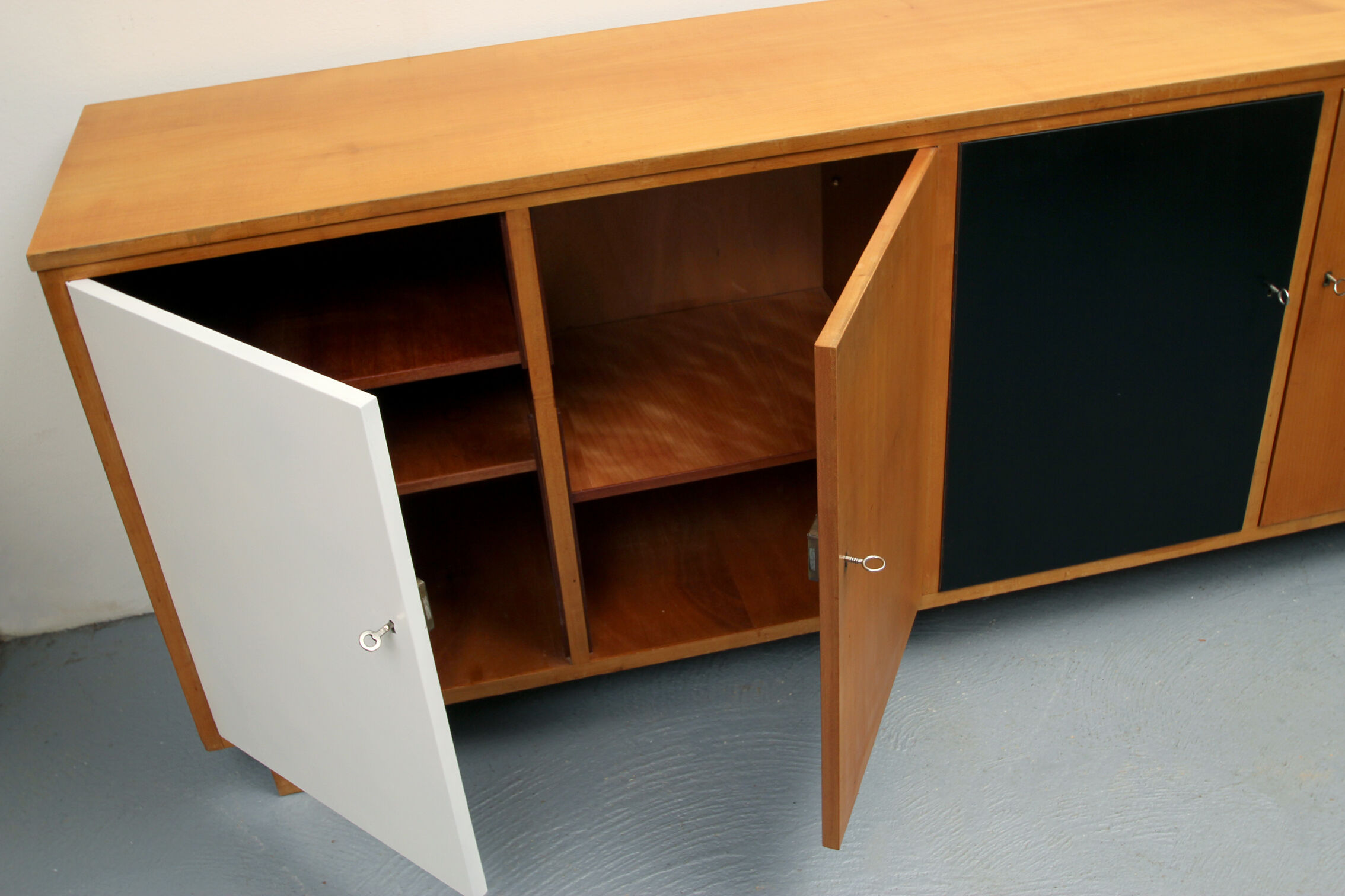 Sideboard in cherrywood with black and white doors 1950s