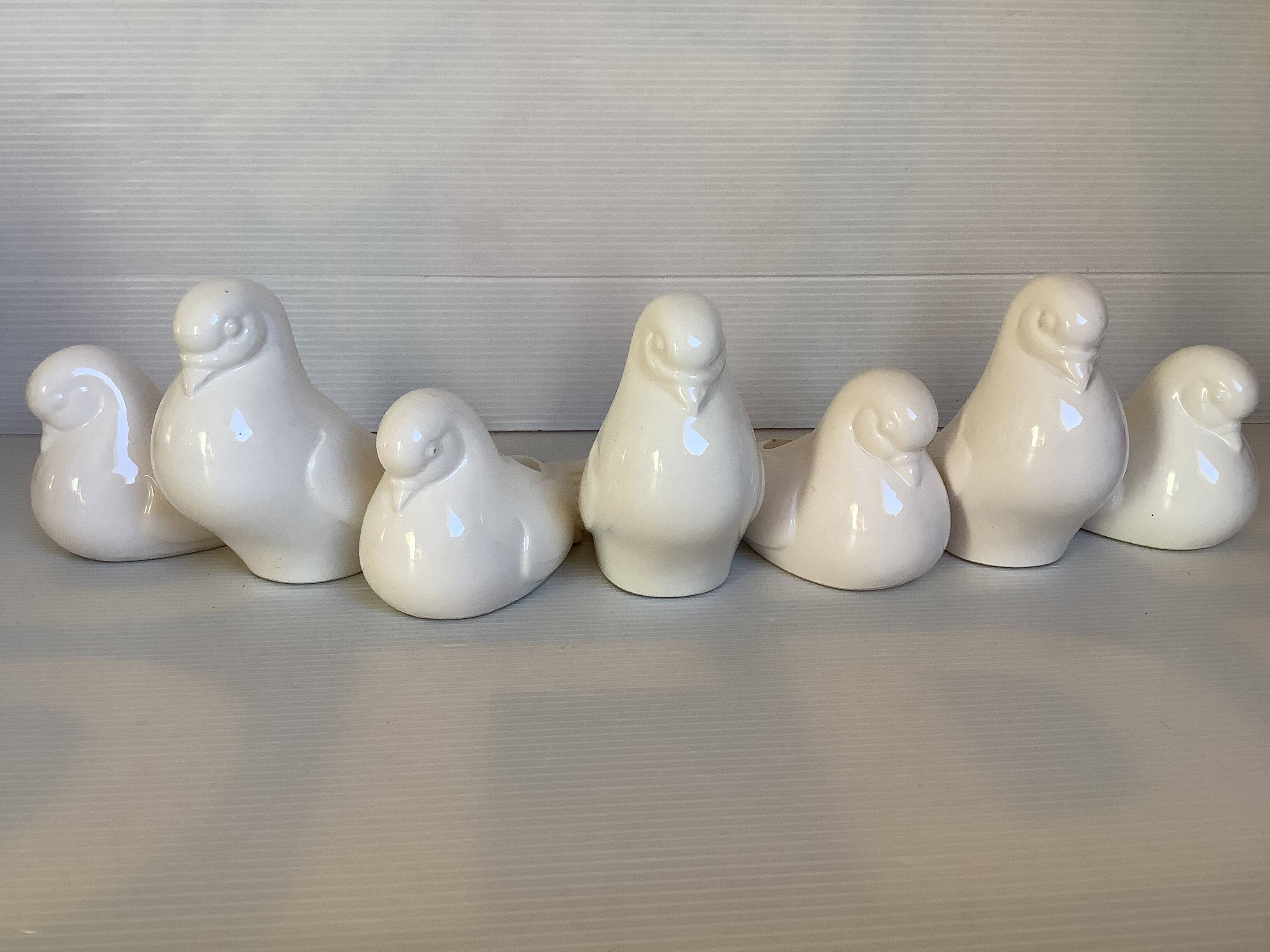 Seven dove bird candle holders