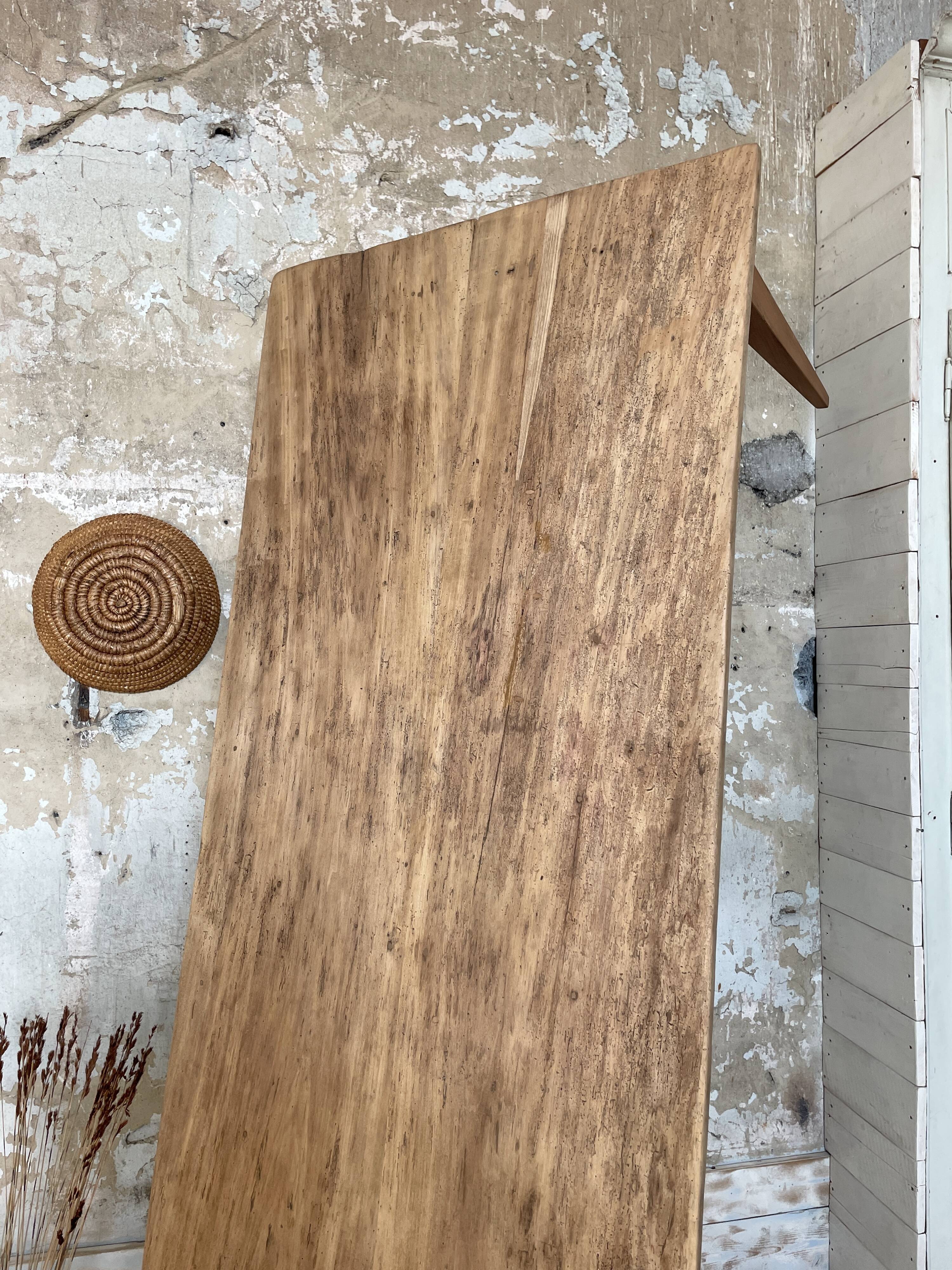 Vintage farm table with spindle legs.