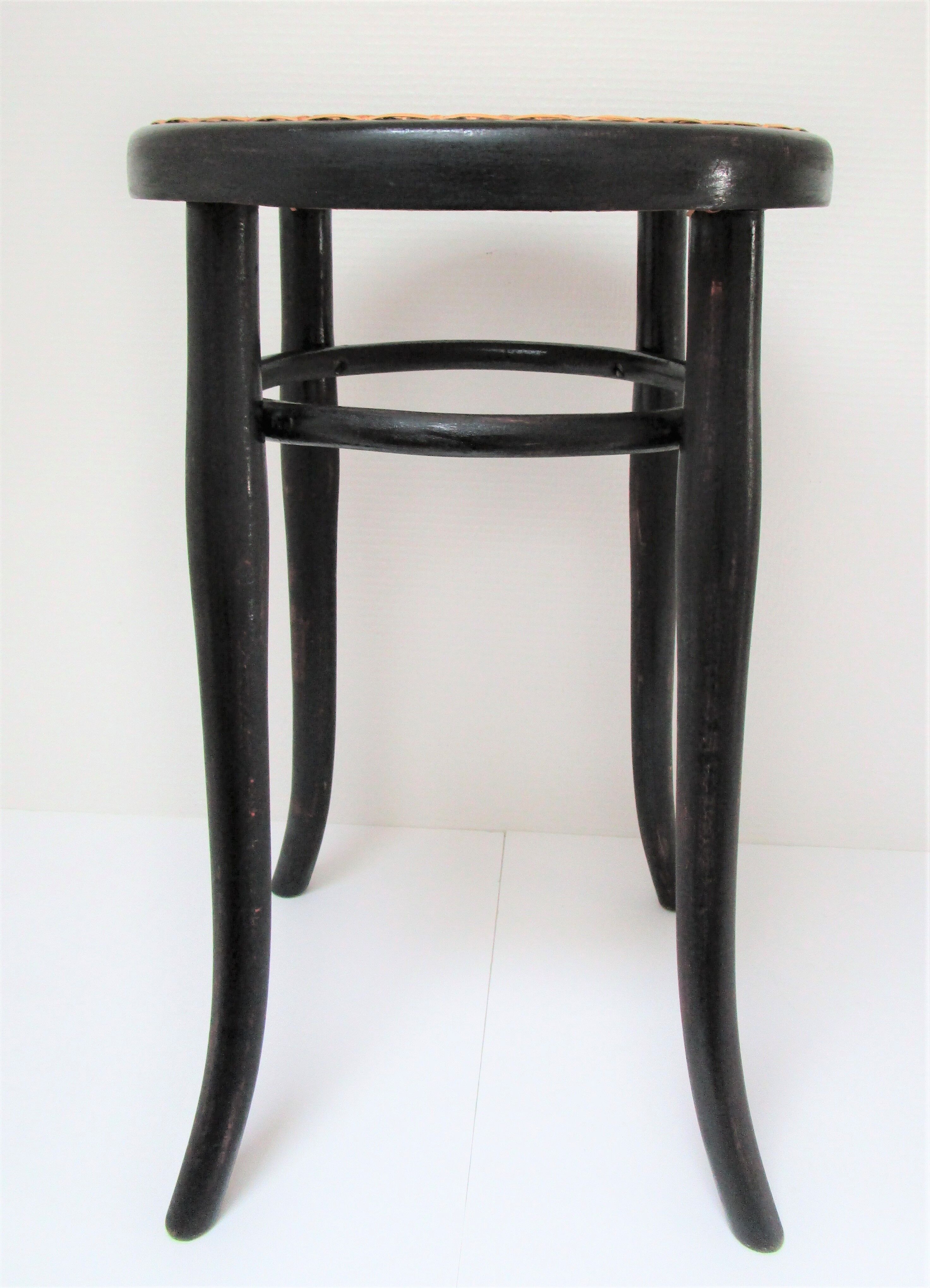 Black skated Thonet stool stamped