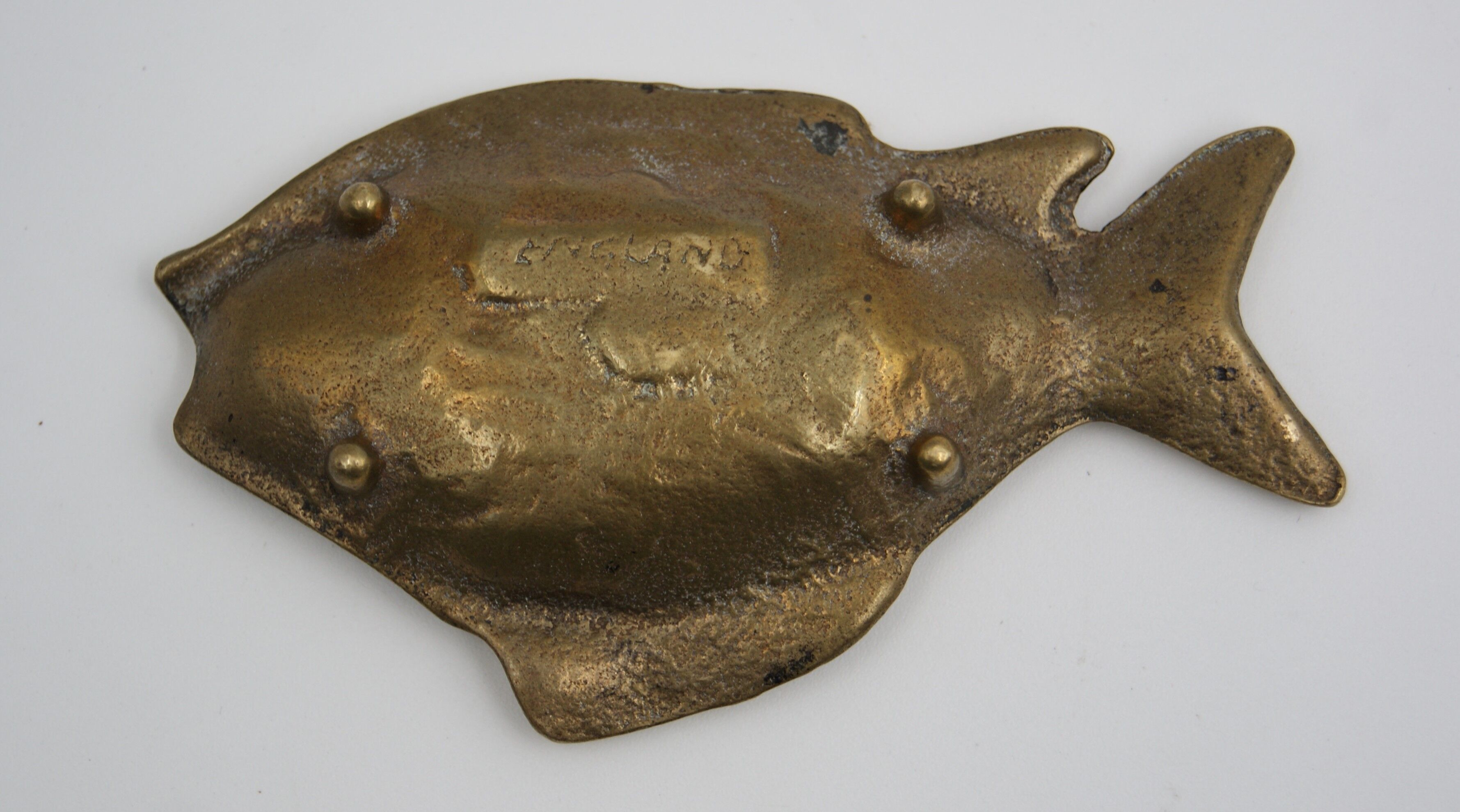 Empty bag brass fish England