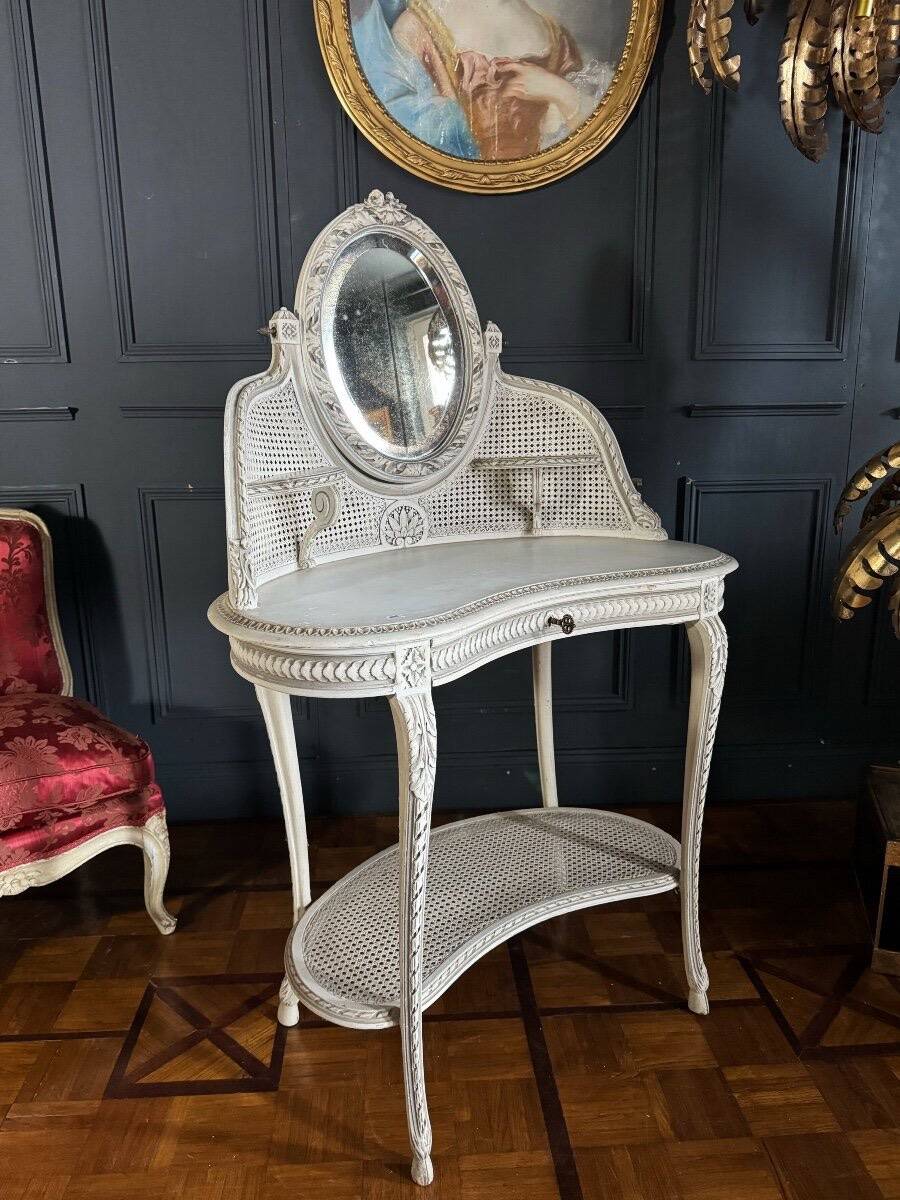 Coiffeuse du XIXe en bois peint et cannage de style Louis XVI