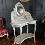 19th-century painted wood and caned dressing table in Louis XVI style.