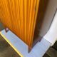High cabinet with 2 doors in teak and vintage veneer from the 60s