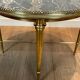 Round coffee table in brass with a marble top from the Ramsay house.