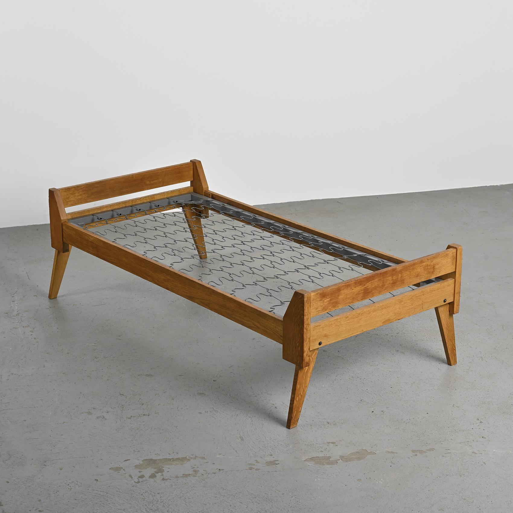 Wooden bench with midnight blue fabric, France, circa 1955