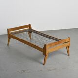 Wooden bench with midnight blue fabric, France, circa 1955
