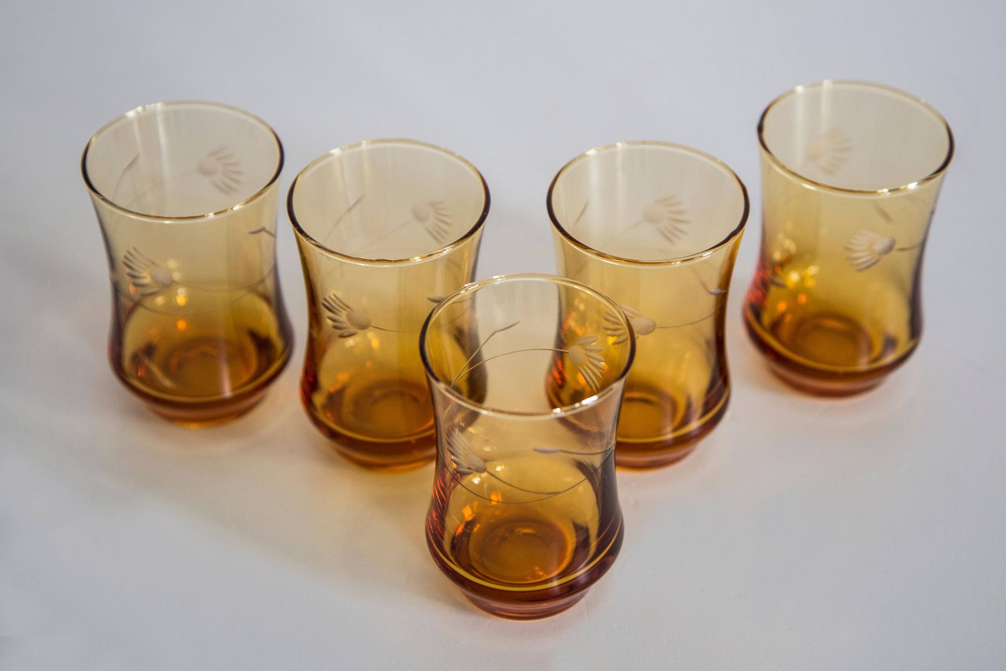 Set of six mid-century glasses and yellow Murano pot, Europe, 1960s.
