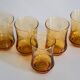 Set of six mid-century glasses and yellow Murano pot, Europe, 1960s.