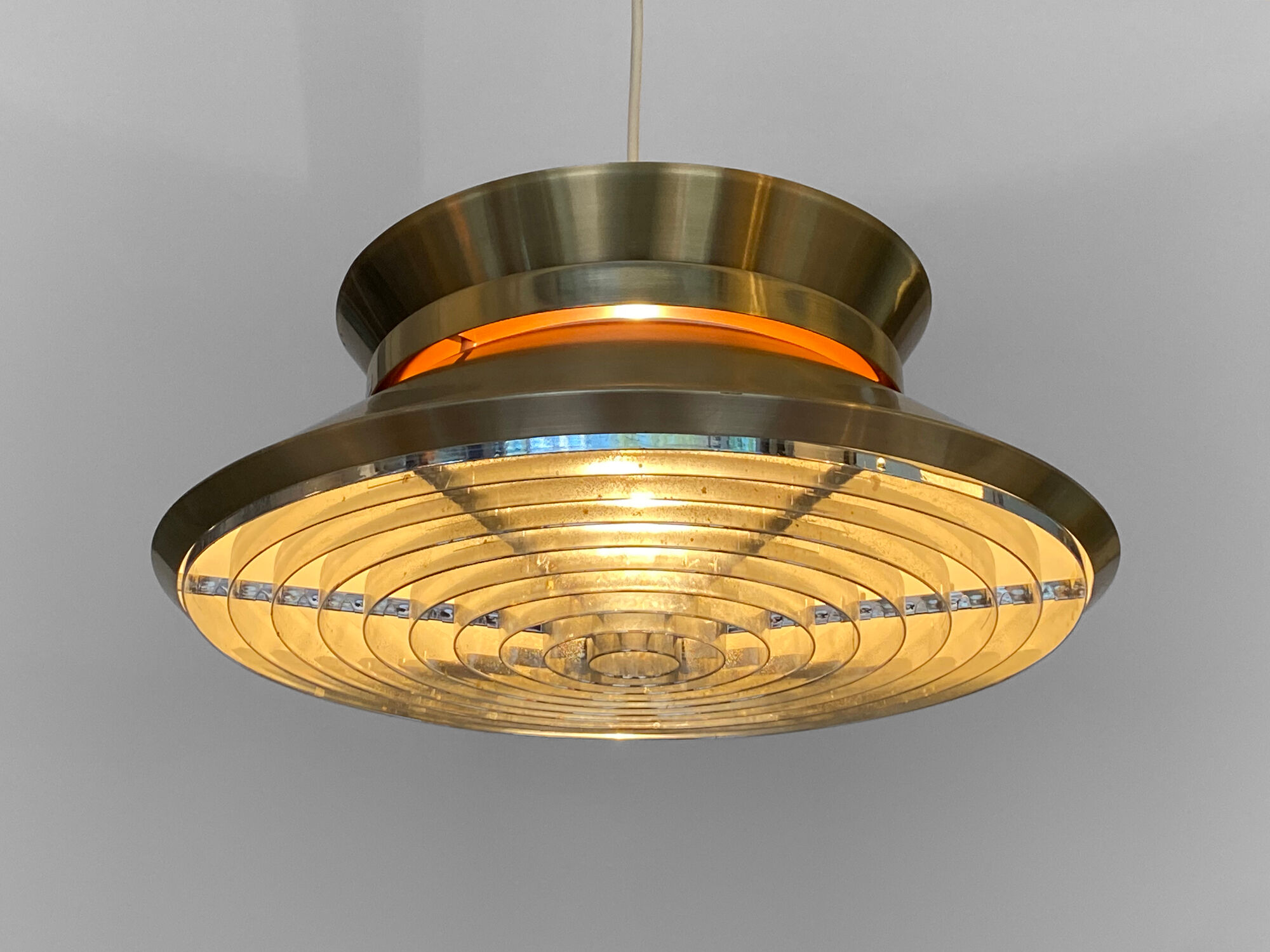 Brass colored aluminium pendant light by Carl Thore for Granhaga Metall. Sweden 1970s.