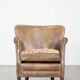Fauteuil en cuir subtil avec coussin d'assise réversible en kilim