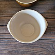 Vintage earthenware bowl with handles, brown colour.