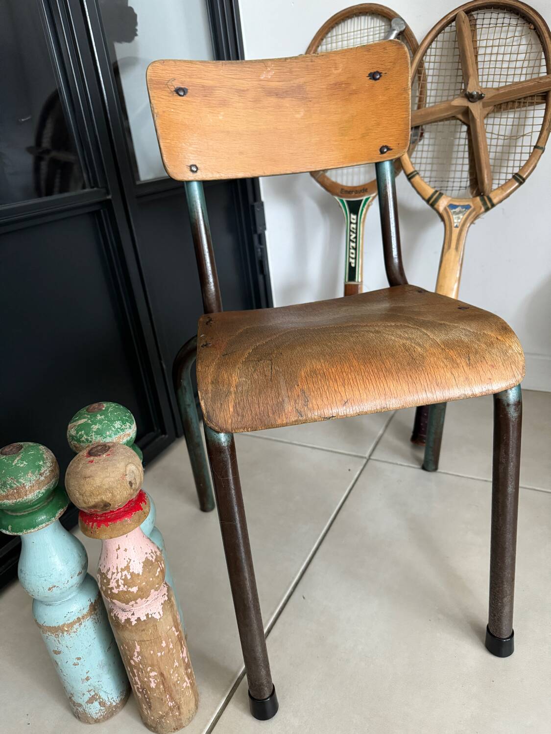 Old wooden and metal children's school chair