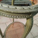 Old oval table with marble top, Louis XVI style