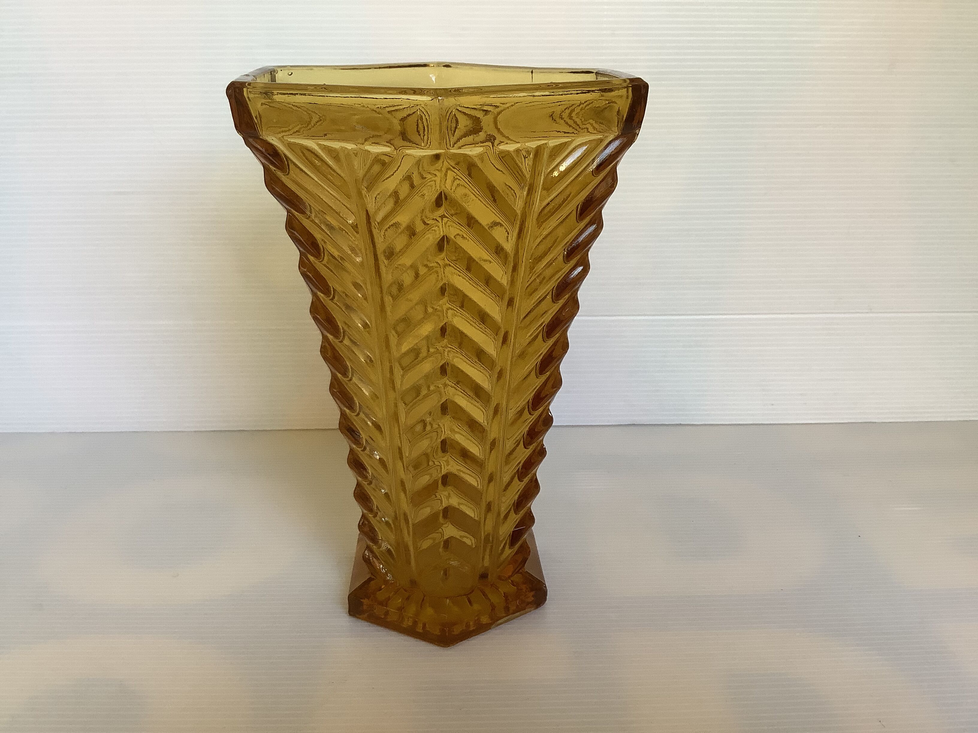 Old yellow molded glass vase chevron pattern