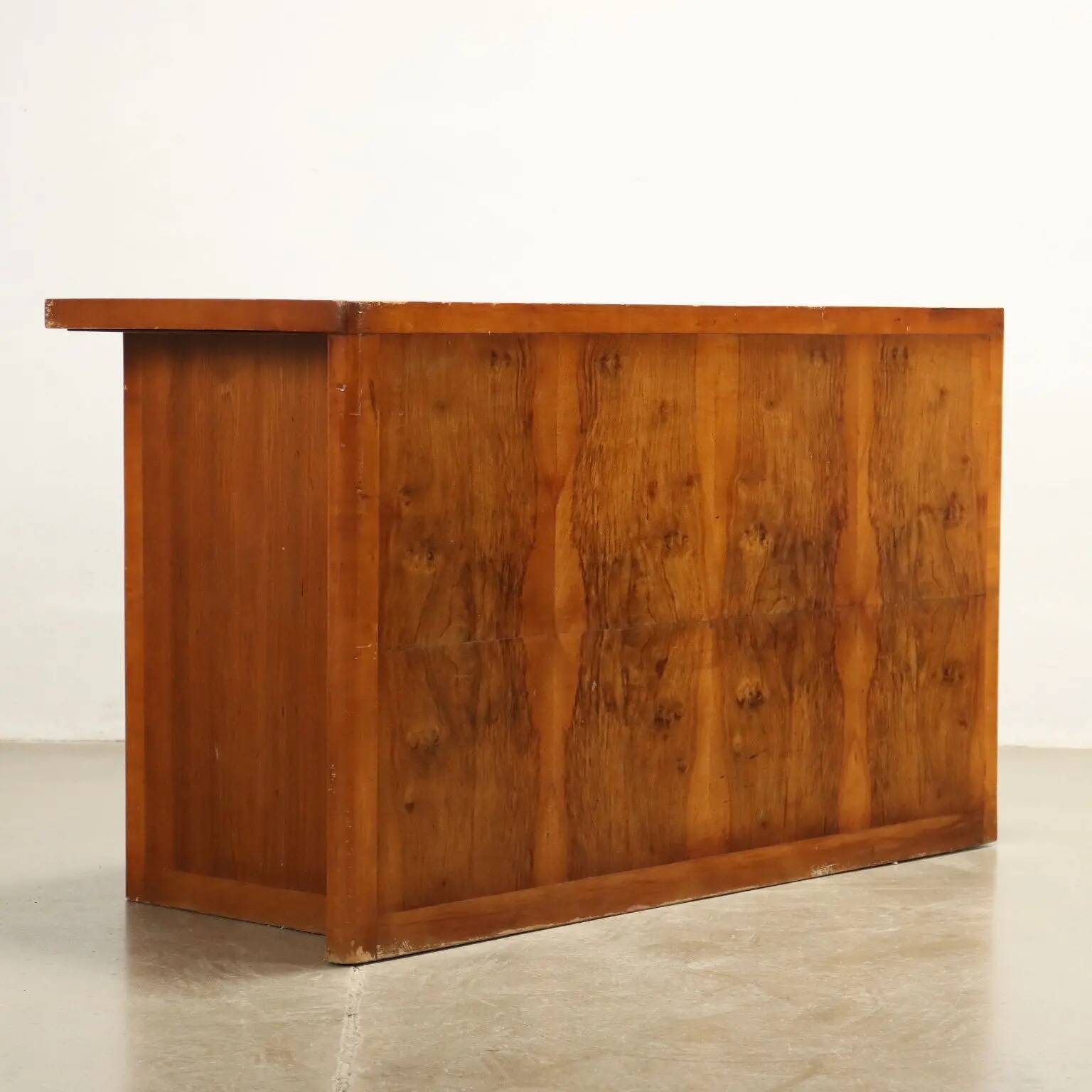 Vintage desk from the 1940s with side drawers in walnut, Italy.