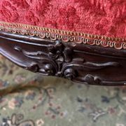 Napoleon III medallion armchair in carved wood and red velvet.