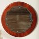 Vintage round teak mirror from the 1960s.