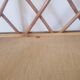 Rattan wall shelf