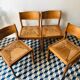4 vintage pine chairs sitting straw