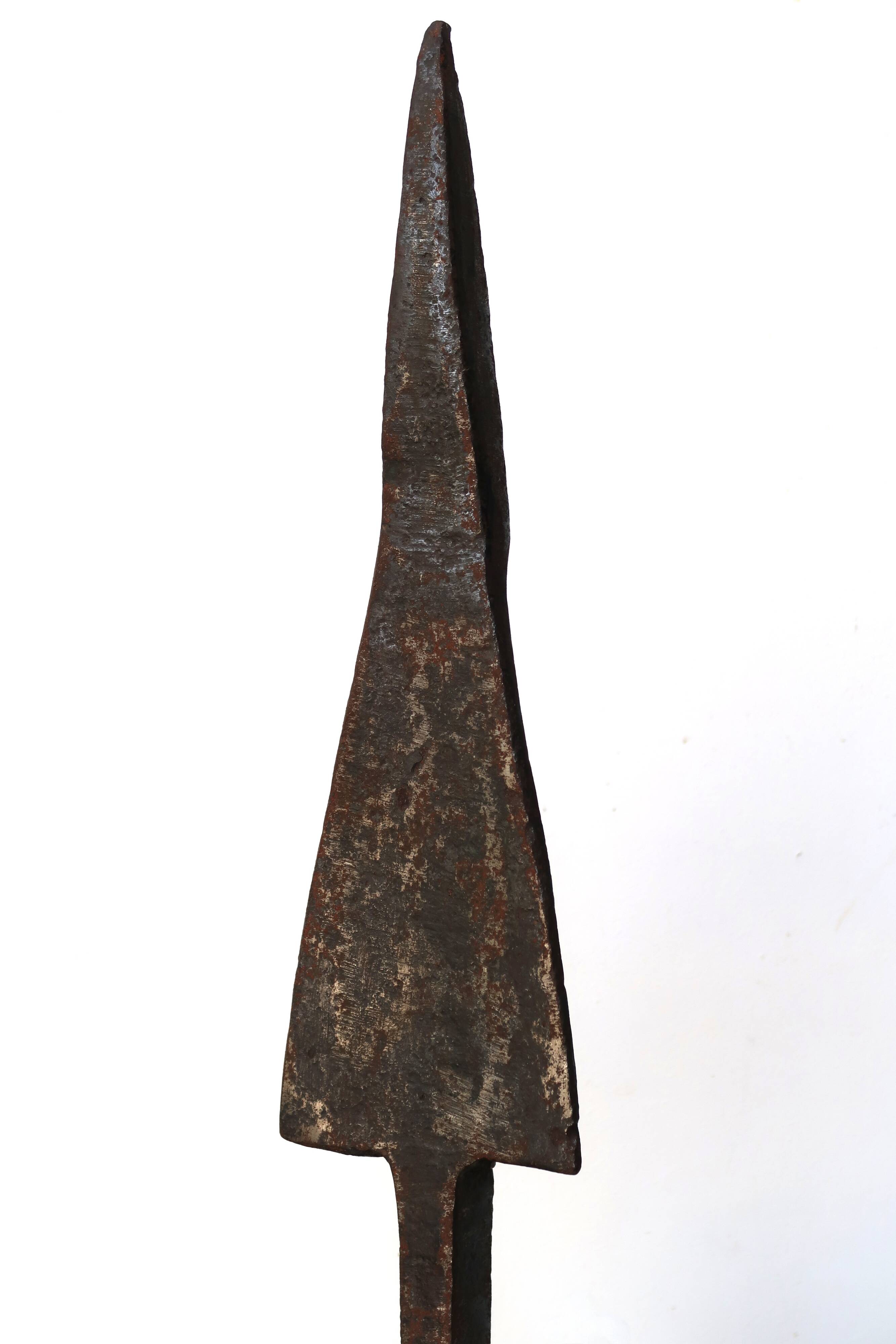 Imposing brutalist wrought iron candlestick "spear", signed, 1950s.