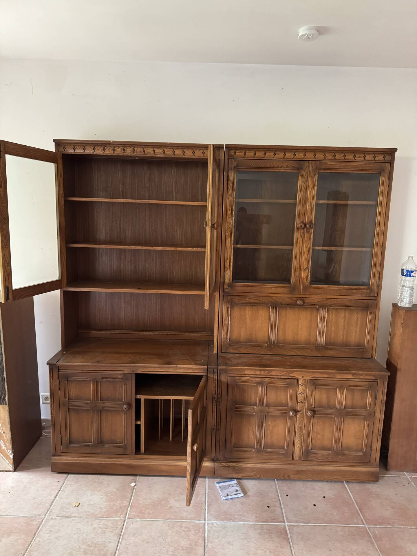 Ercol library cabinets storage England in elm