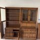 Ercol library cabinets storage England in elm