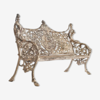 Sculpted cast iron bench and white patina wood
