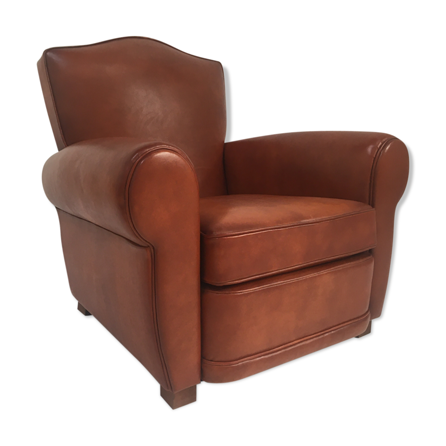Large club chair in cognac leather