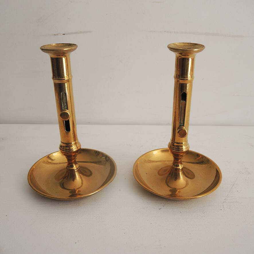 2 antique brass push candle holders
