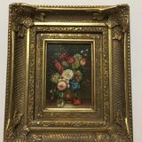Oil on panel in the center of a frame