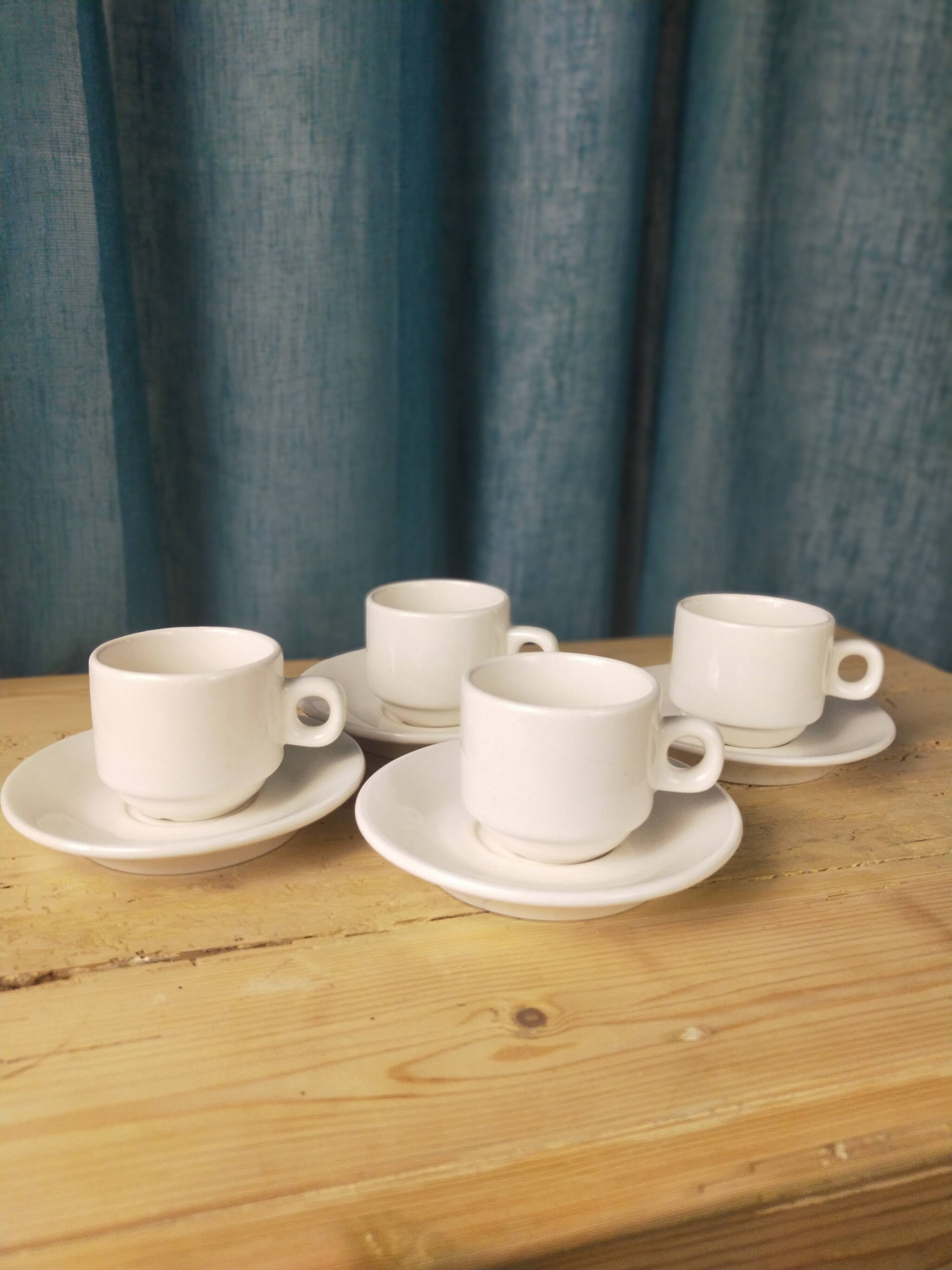 4 fours and 4 bistro coffee saucers