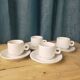 4 fours and 4 bistro coffee saucers