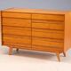 Vintage Czech chest of drawers U-453 by Jiří Jiroutek, 1960s, oak veneer, 110 × 45 × 77 cm