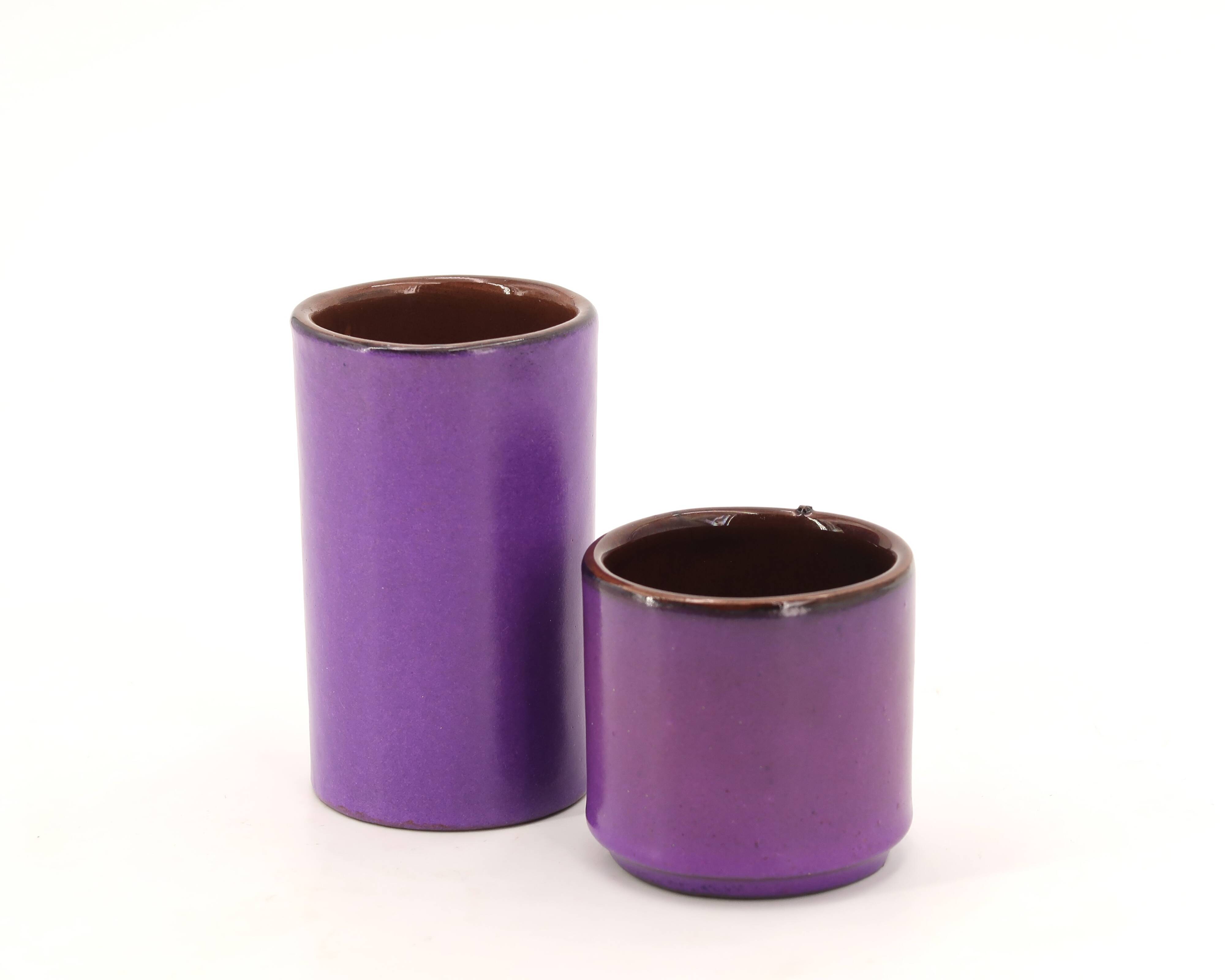 Two purple ceramic roller vases, 1970s