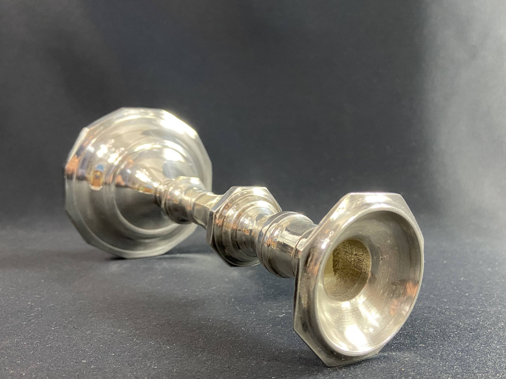 Regency style silver-plated bronze torch candle holder